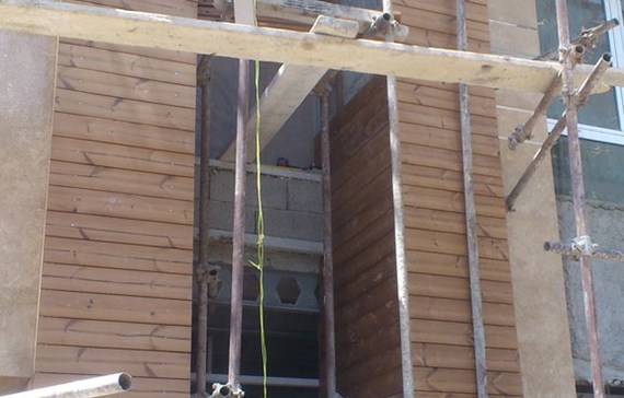 نمای چوب ترمو ساختمان مسکونی دروس