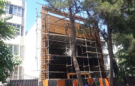 نمای ساختمان با ترموود و شیشه فریم لس